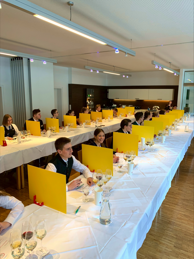 Kandidat*innen verkosten